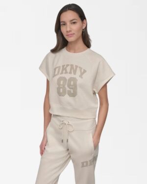 ARCHED DKNY 89 DISTRESSED RHINESTONE LOGO CROPPED
