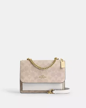 Mini Klare Crossbody Bag In Signature Canvas