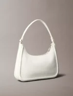 Embossed Monogram Logo Shoulder Bag | Rivella couture