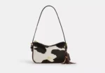 Kailey Shoulder Bag With Cow Print And Tassel | rivella couture