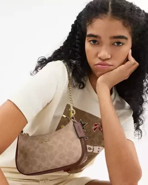 Teri Mini Crossbody Bag In Signature Canvas